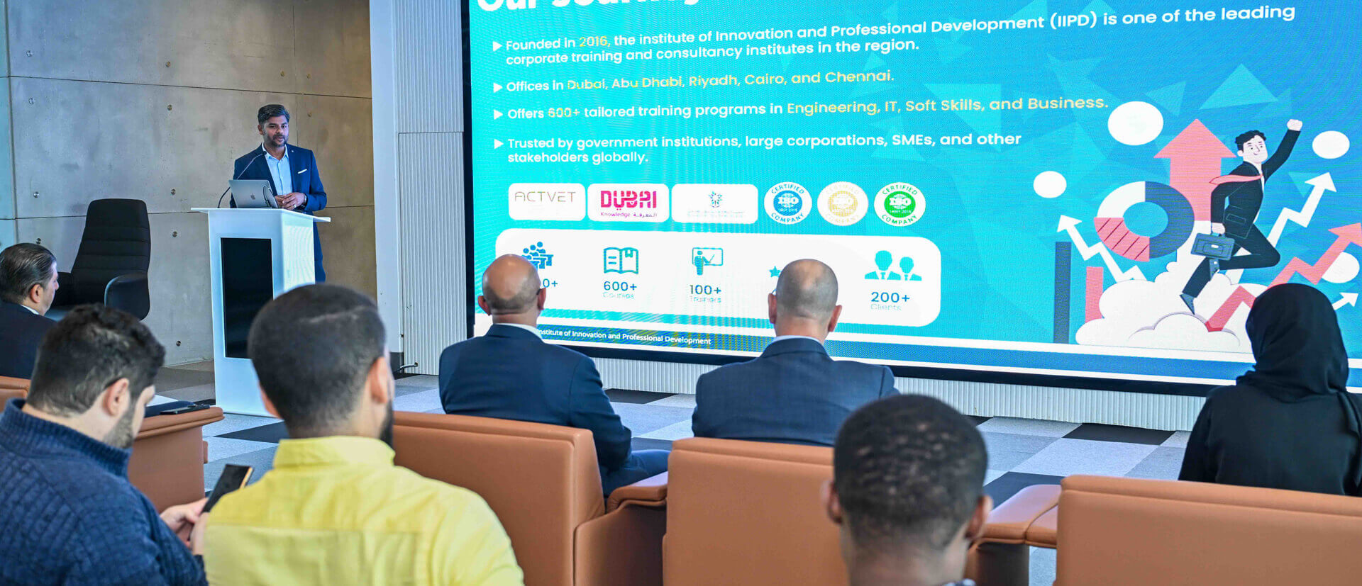 Professor Bayan and IIPD CEO Farooq signing documents